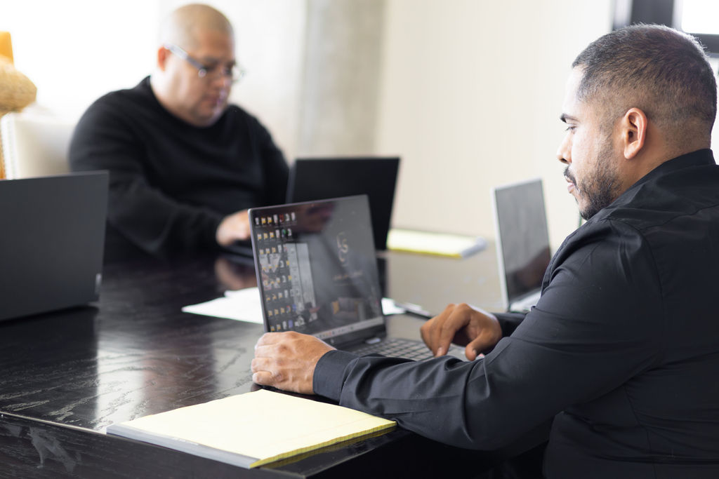 Level Up Client Services legal support team collaborating on case production and client management
